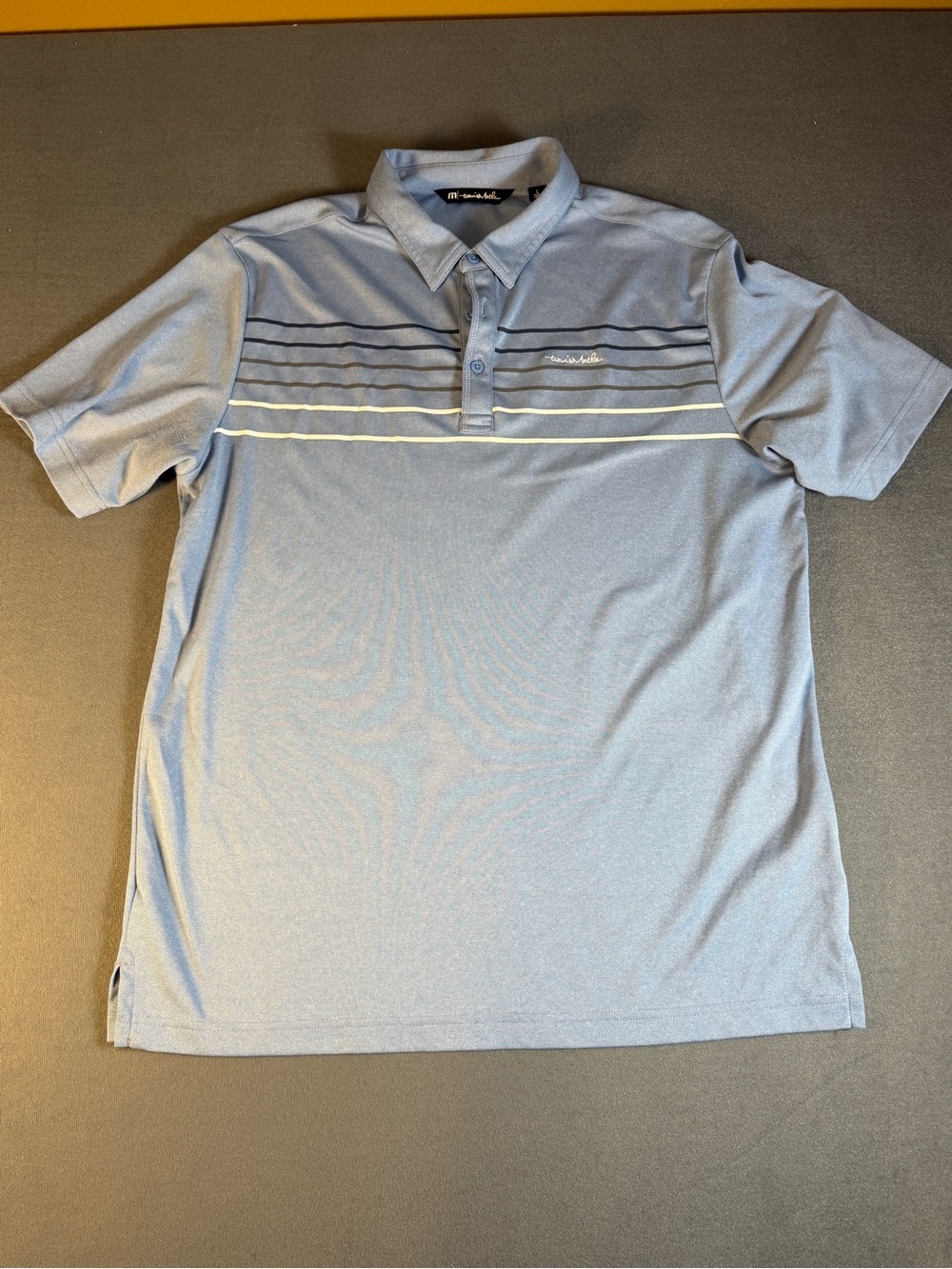 Travis Mathew Light Blue Polo with Contrast Chest Stripes